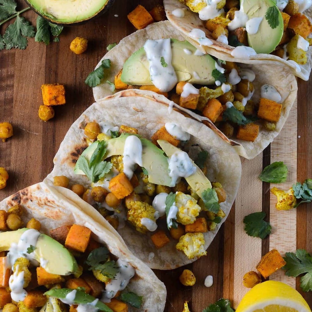 This is a photo of tandoori sweet potato cauliflower tacos.