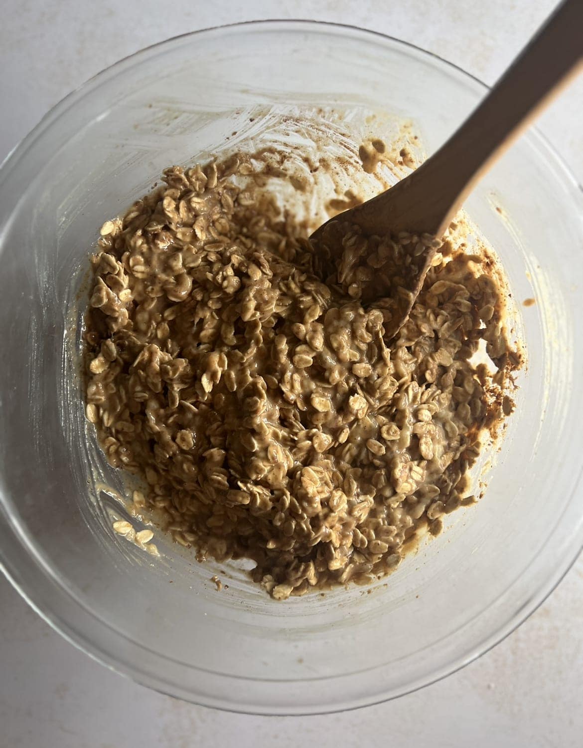This is a photo of banana oatmeal bars batter with oats added.