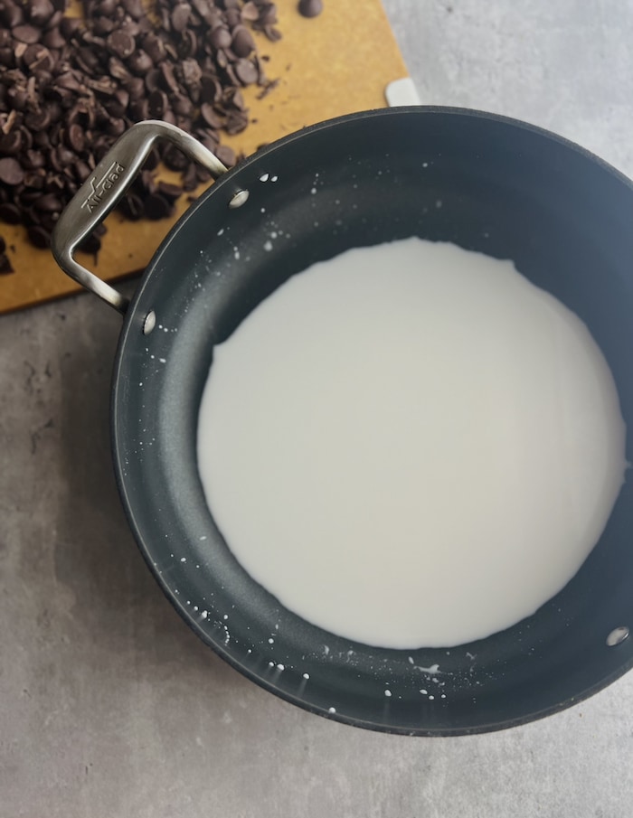 This is a picture of coconut milk in a pan.