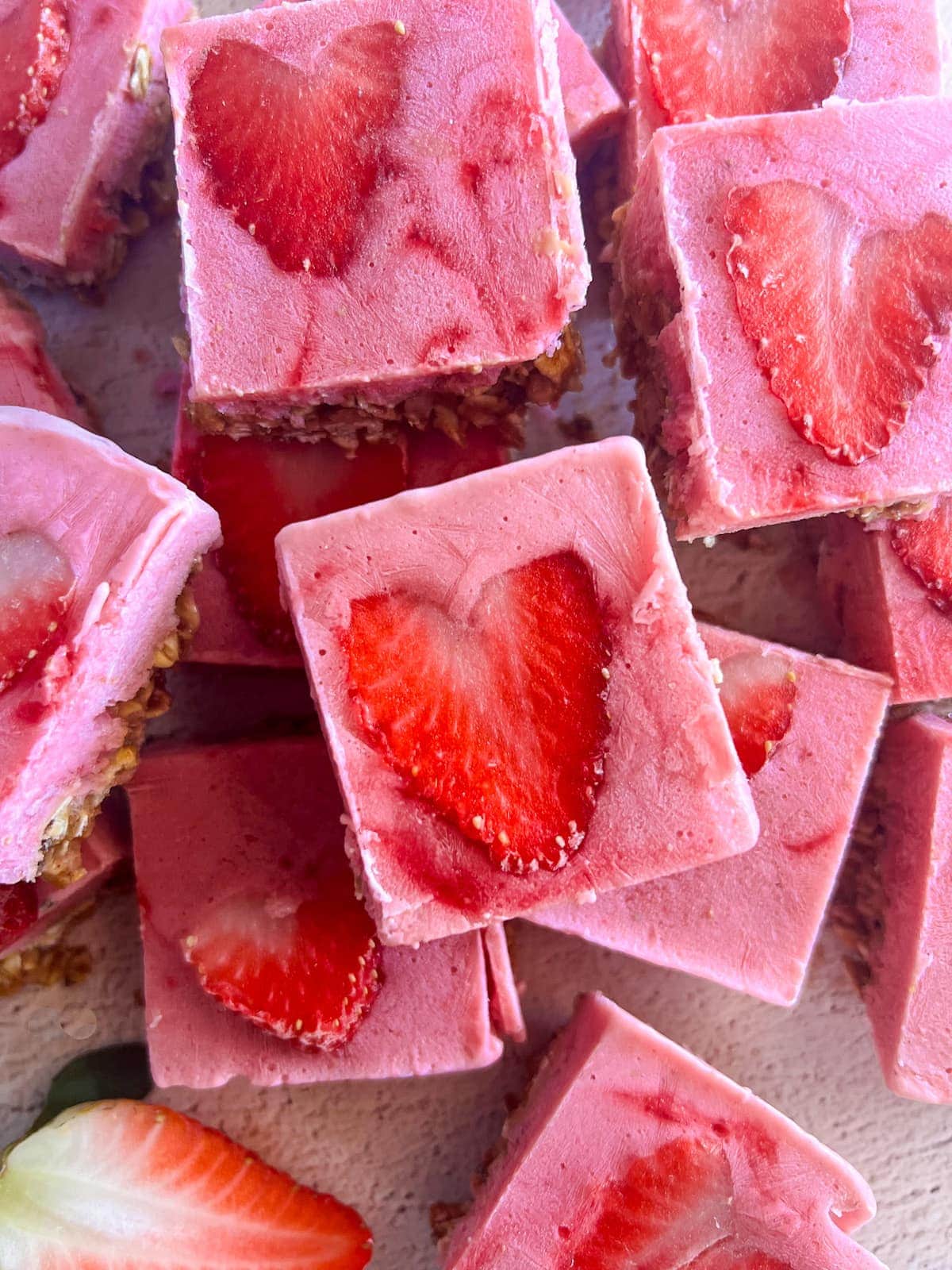  This is a photo of strawberry frozen yogurt bars close up. 
