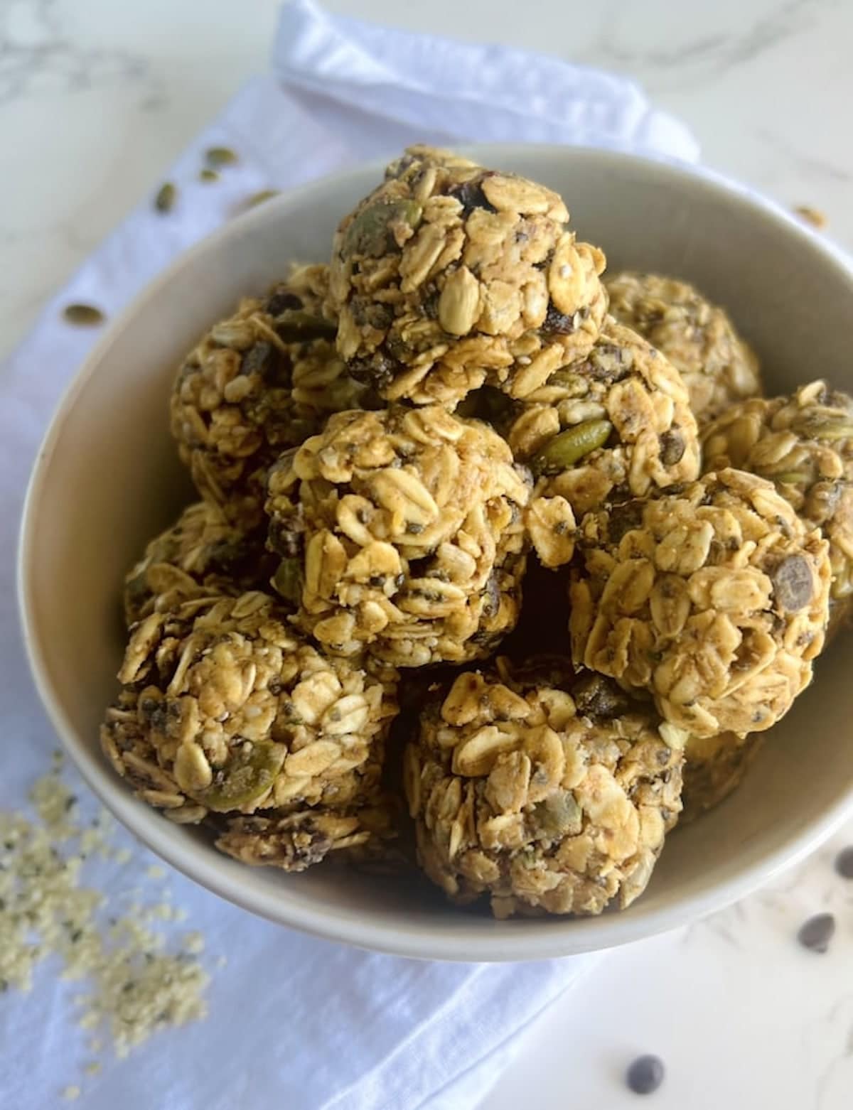 This is a photo of no bake peanut butter energy balls in a bowl.