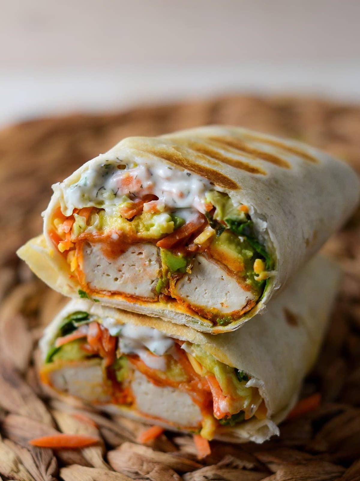 This is a photo of the wrap close up with vegan ranch drizzle. 