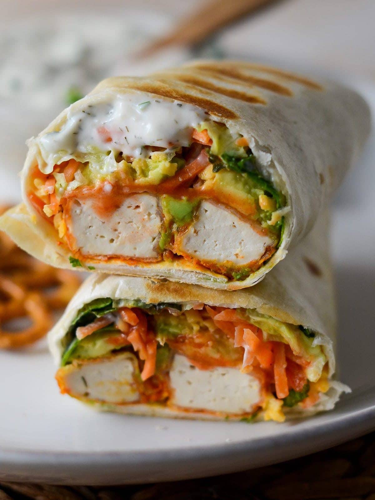 This is a photo of buffalo tofu wrap close up picture.