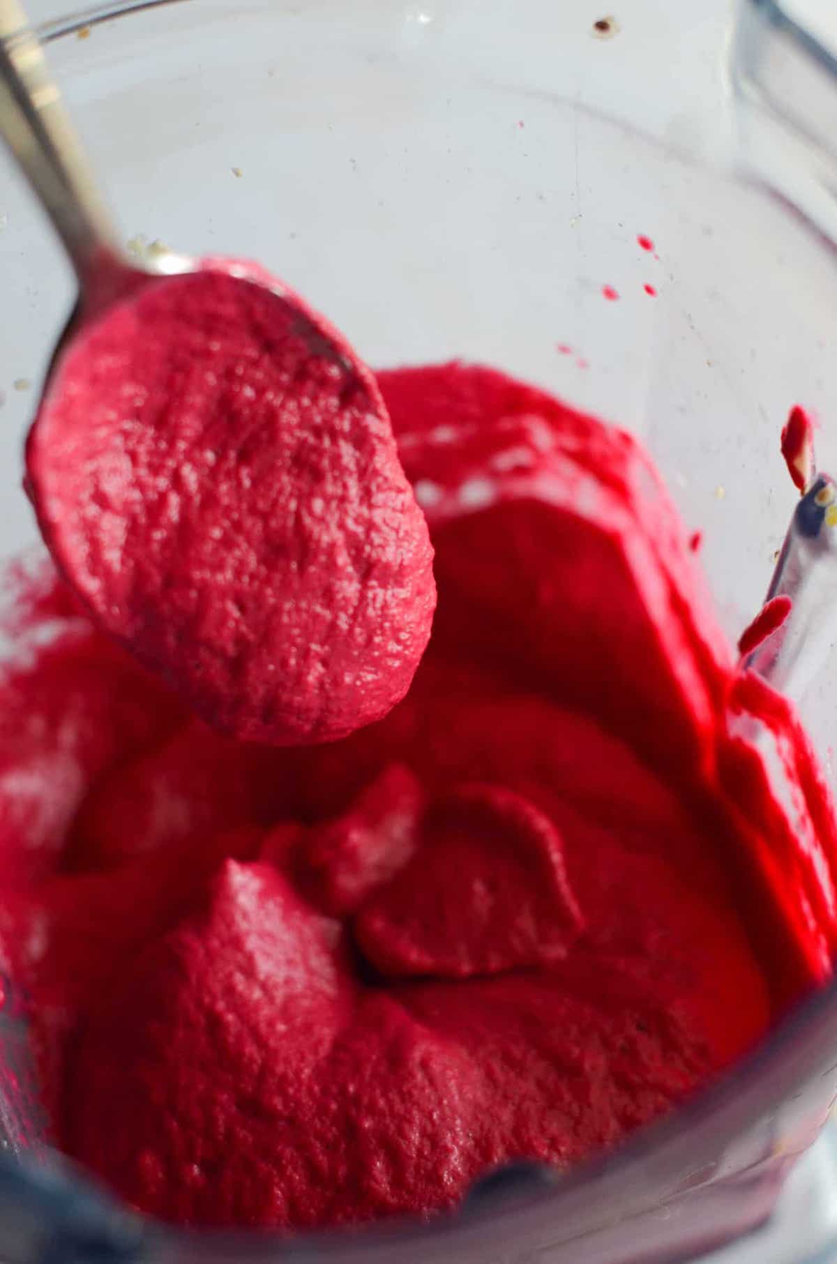 This is a photo of creamy beet sauce after it was blended.