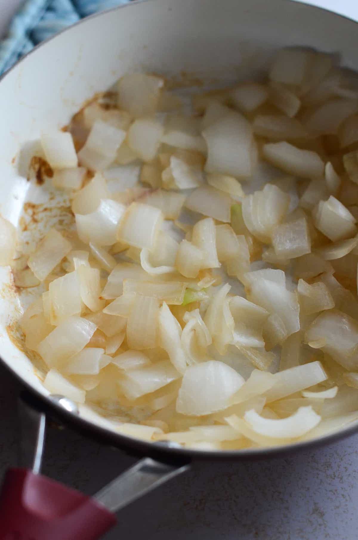 This is a photo of sauteed onions in a pan. 