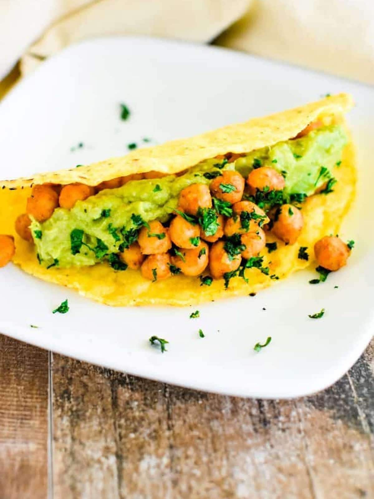 a chickpea taco on a plate. 