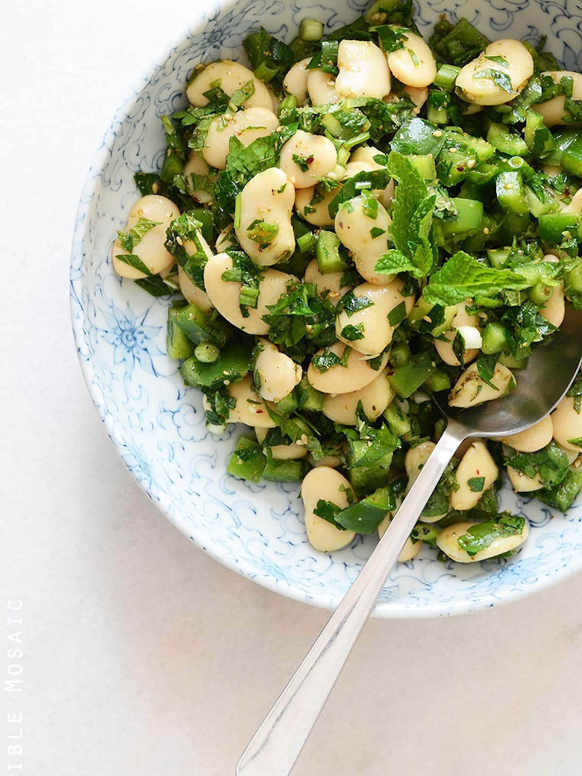 a small bowl of butter bean salad. 