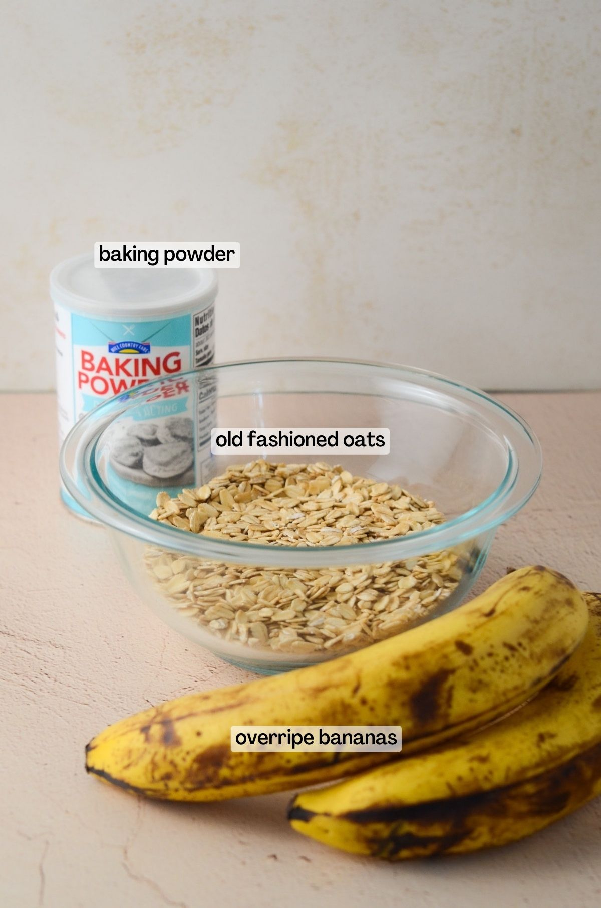 This is a photo of the ingredients including oats, baking powder, and overripe bananas.