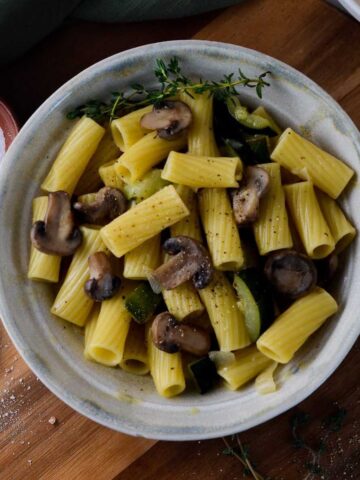 This is a photo of one pot zucchini mushroom pasta (vegan) in a bowl.
