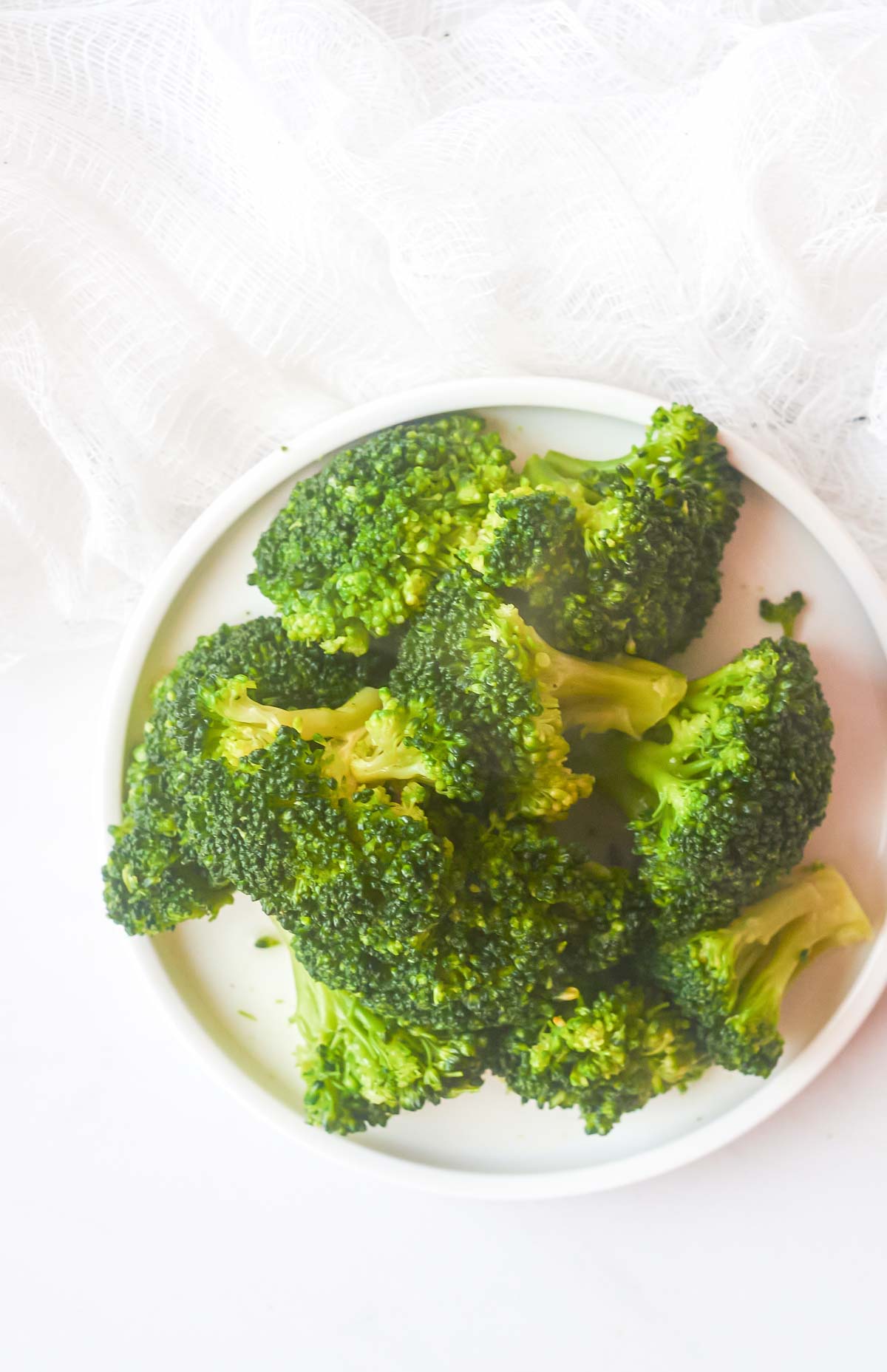 broccoli chopped on a plate.