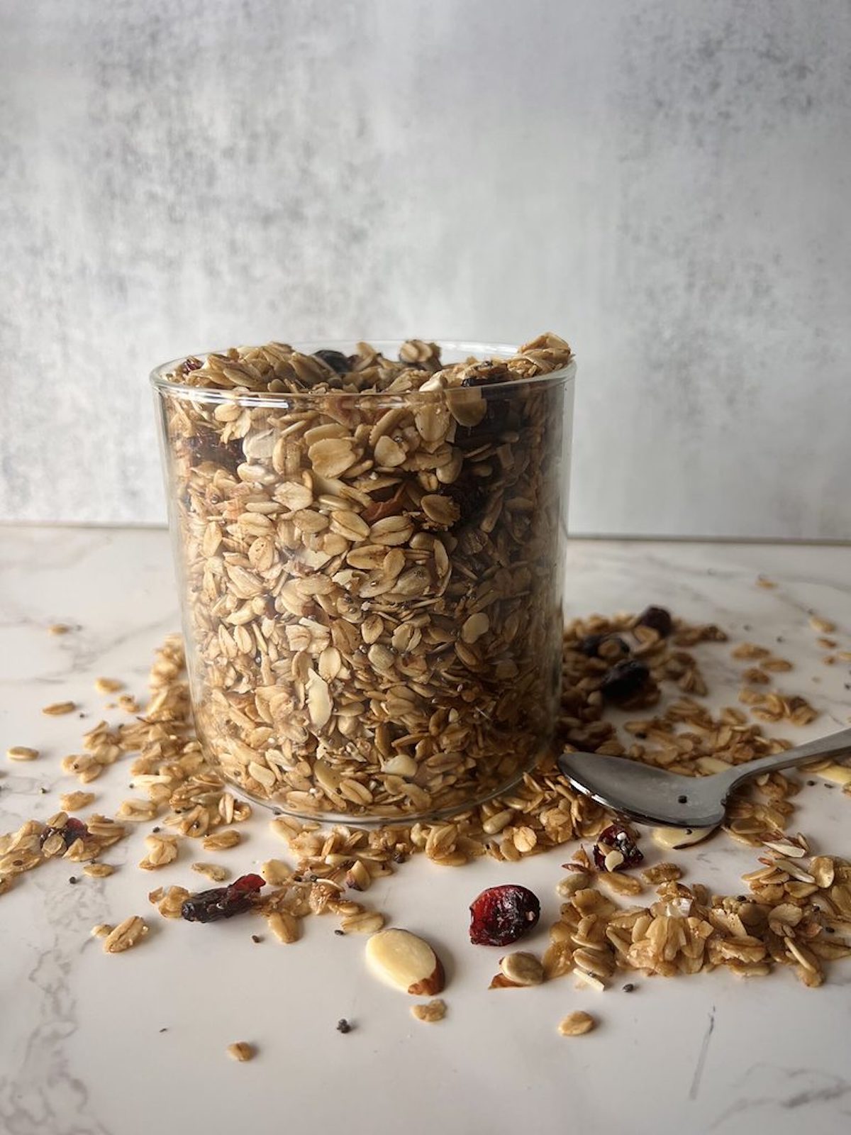 This is a photo of stovetop granola in a container. 
