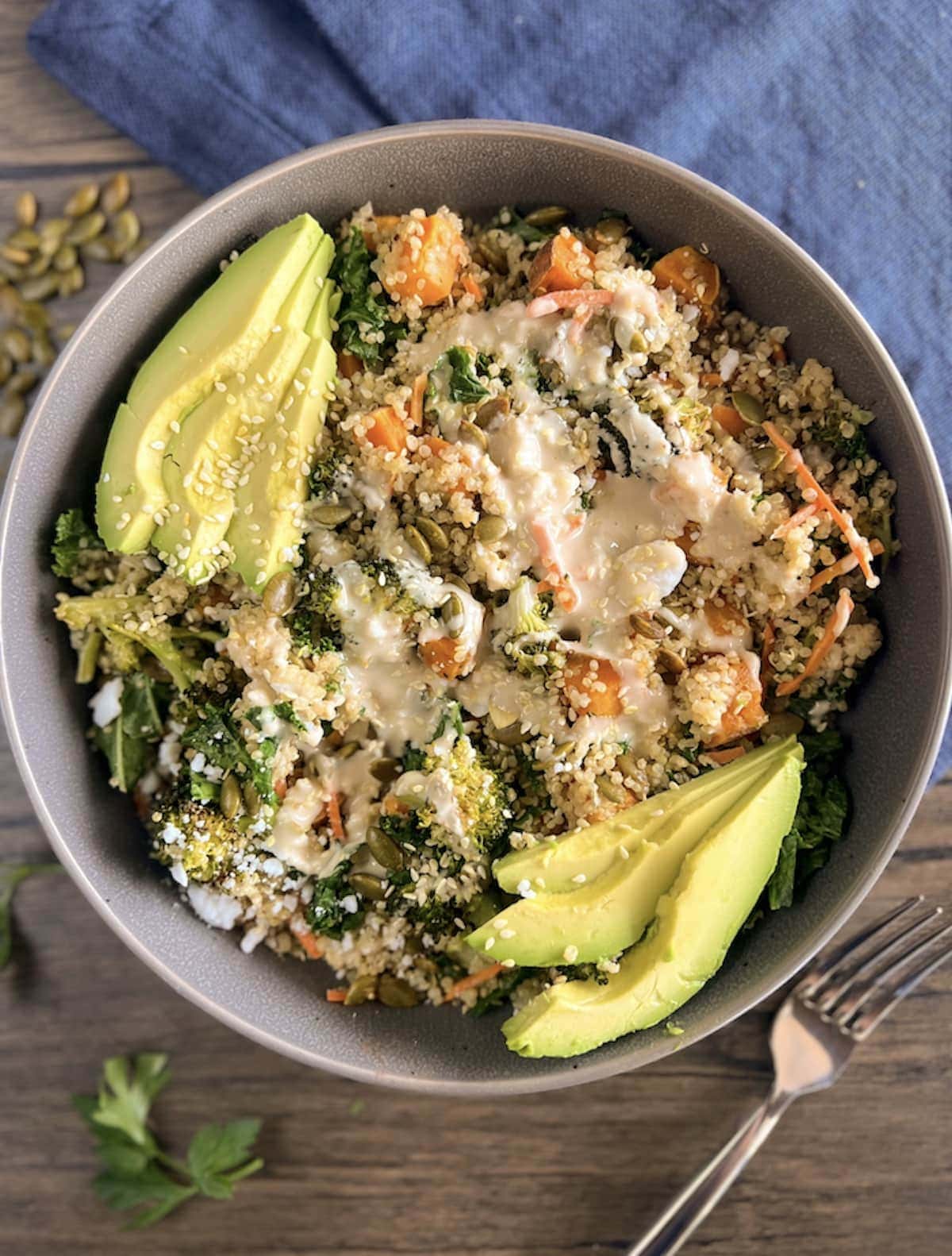 Bowl of warm roasted veggie quinoa salad