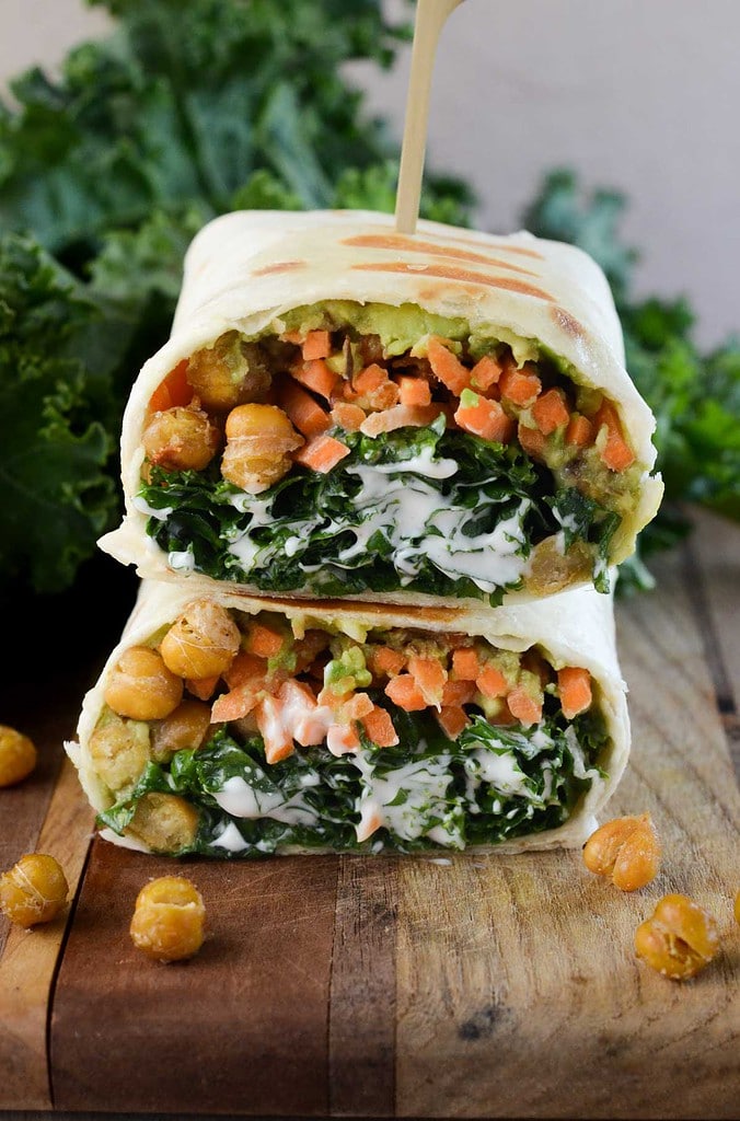 caesar kale wrap the front view on a cutting board