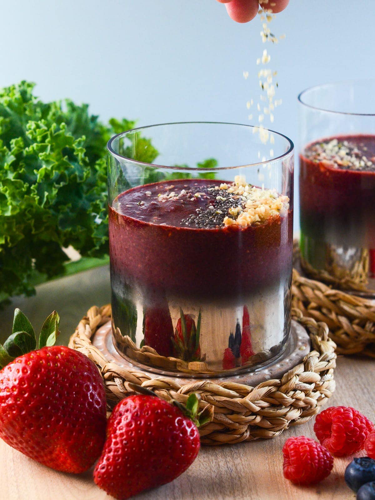 a sprinkle of hemp seeds over the smoothie glass